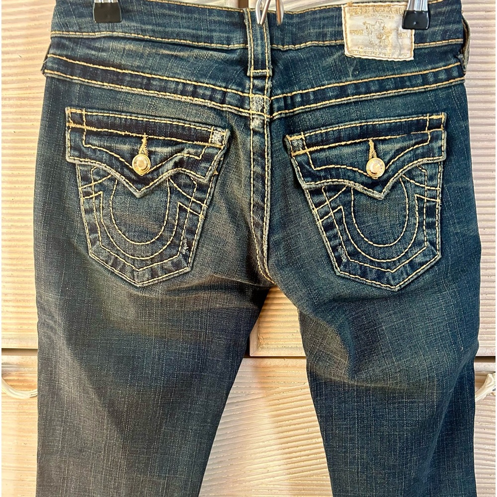 True Religion Women’s jeans with tan stitching & gold & crystal hardware.